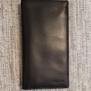 Coach Black Leather Tall Wallet/ Passport. 4 1/4" × 7 3/4"